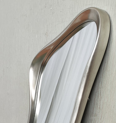 Sculptural silver frame detail