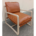 Brown Accord Armchair with a foam-filled PU seat and slender oak legs