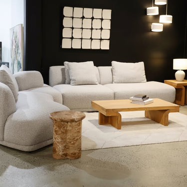 Grey Algar Sectional Sofa with an architectural modular flow that breaks the usual rectangle
