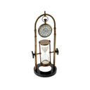 Arch Revolving Sand Timer with Hanging Clock in brass and black aluminium with an arched frame