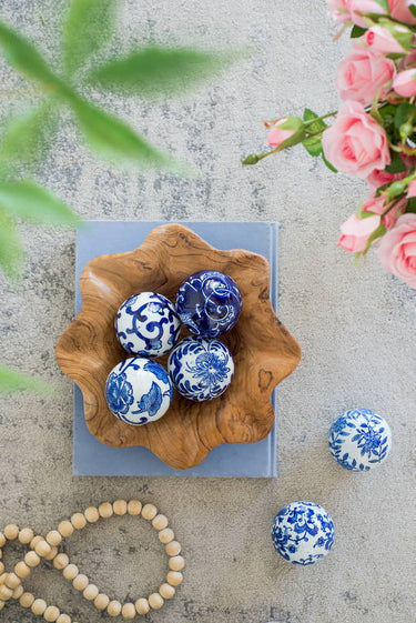 Blue and white patterned porcelain orbs with traditional chinoiserie decoration