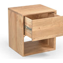 Angled view of the Da Vinci acacia bedside table showing its natural timber grain