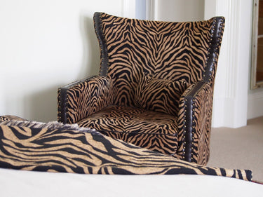 Instinct Wingback Armchair with Brass Studs at online8 furniture store Auckland