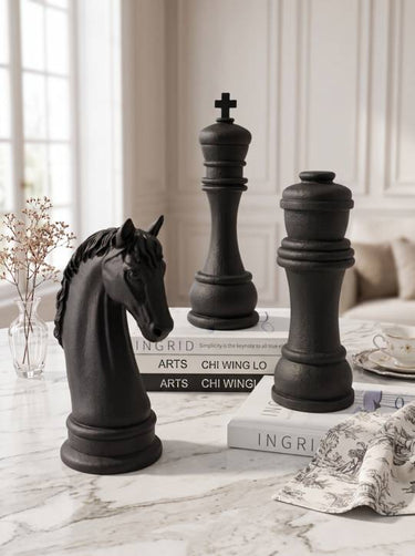Black polyresin king chess ornament measuring 11 x 10 x 31cm high