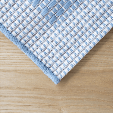 Makana Indoor/Outdoor Border Light Blue Rug at online8 furniture store Auckland
