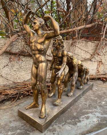 Man's Evolution Statue at online8 furniture store Auckland