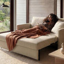 Neah Slim Sofa Bed in pine green, a slim-arm two-seater sofa bed for modern and compact homes