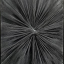 Rapt wall art with twisted black fabric radiating from a central point on canvas