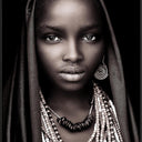 Abeni canvas wall art portrait of a woman in a headwrap with beaded necklaces, black L-frame