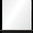 Ovall capsule shaped wall mirror with black glass shelf at the base