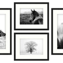 Nostalgia gallery set of four black and white framed prints with white mats and black frames