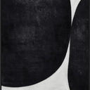 Touch textured canvas wall art with two overlapping black circles on cream, black L-frame