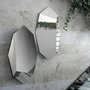 Inseption faceted wall mirror shown in a room setting