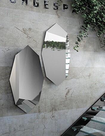 Inseption faceted wall mirror shown in a room setting