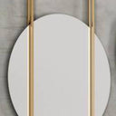 Ovie wall mirror, oval mirror suspended in a slim rectangular gold frame