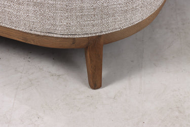 Regal armchair in soft natural weave fabric with solid oak detailing