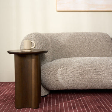 Birch Seattle Curved Sofa with a sculptural flowing form and textured polyester weave