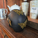 Skull with Metal Butterflies at online8 furniture store Auckland