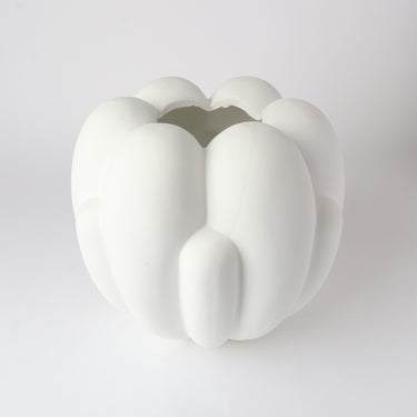 Tino Ceramic Vessel in white styled with a fresh arrangement