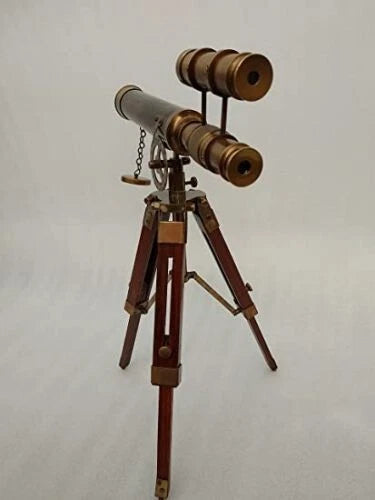 Double-barrel antique brass telescope with a parallel barrel beside the main telescope