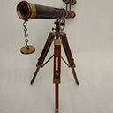 Victorian-style brass telescope with a pull-out sunshade over the lens and 15x magnification